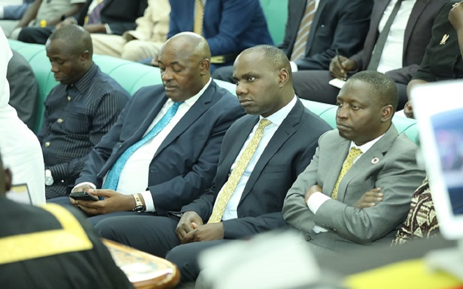 Musasizi (2nd R) said he will present a report on release of the funds