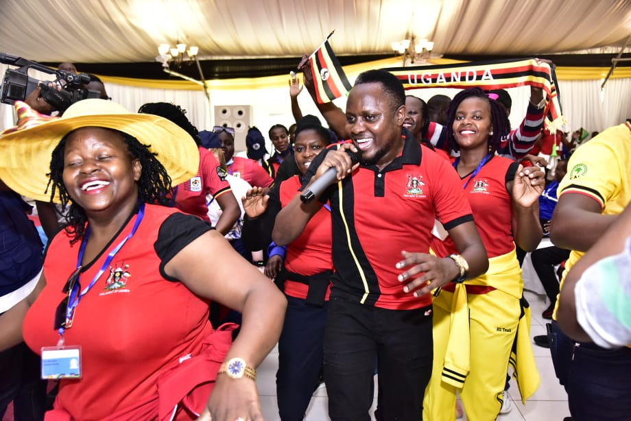 Some of the Ugandan players in a jubilant mood during the opening ceremony of the EAC games. 